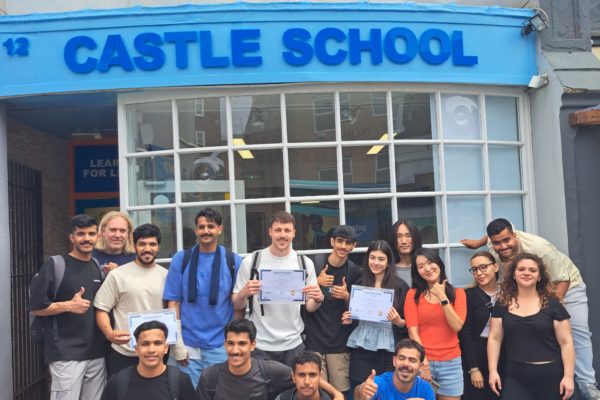 Students and teachers enjoying a friendly English class at Castle School in Brighton